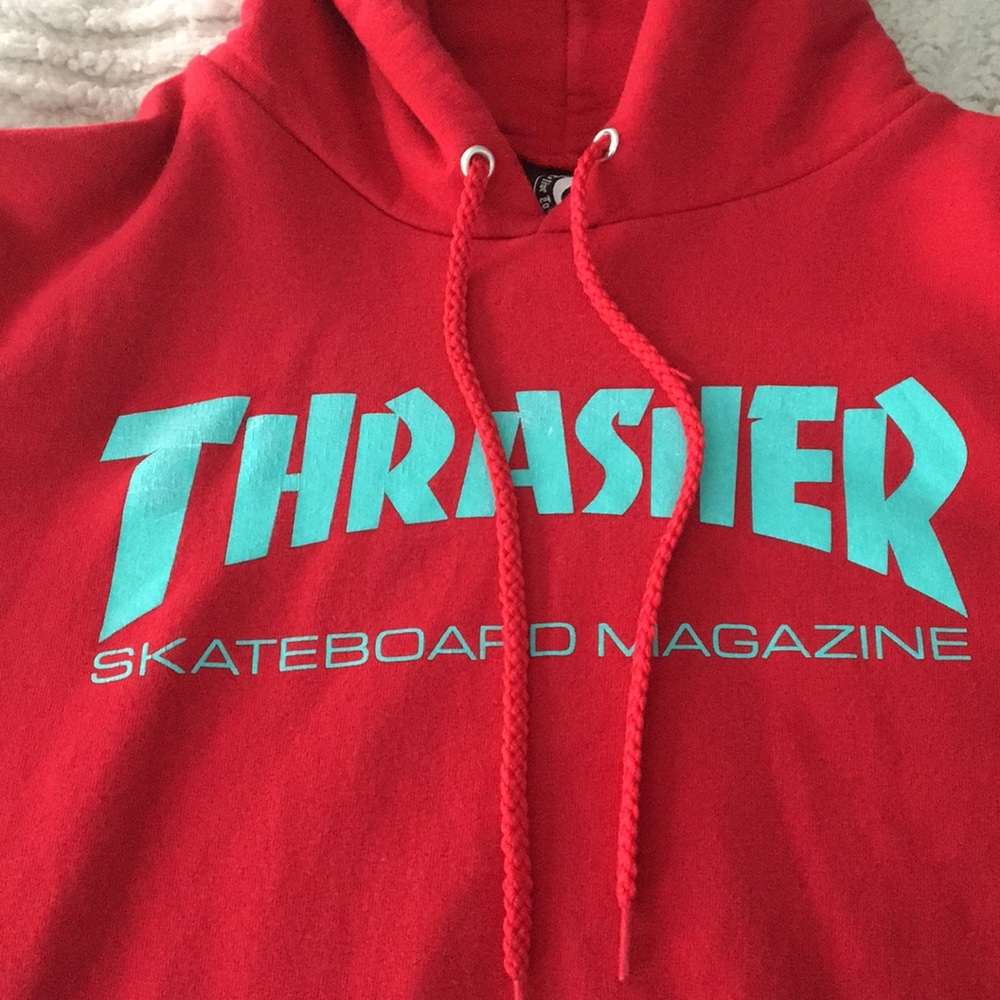 A red Thrasher hoodie.